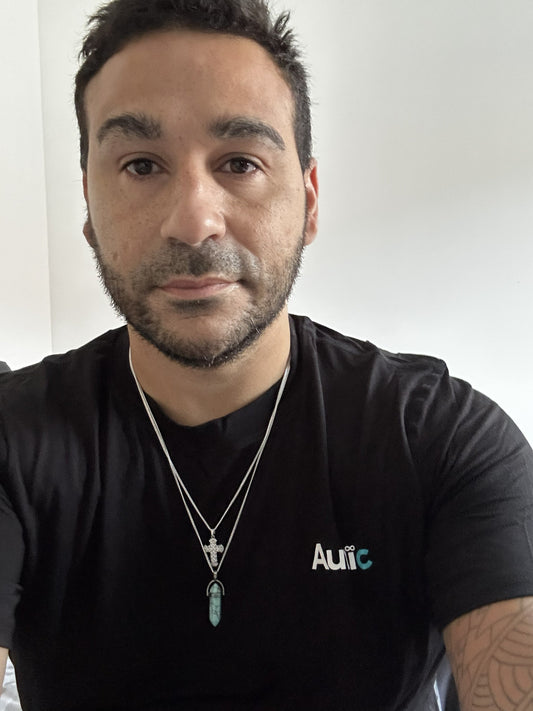 Founder of Autic Designs wearing a black Autic branded t-shirt